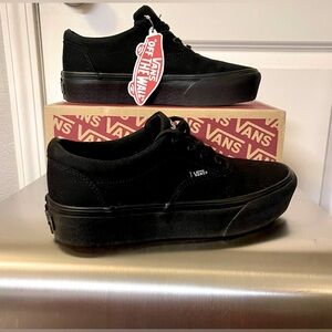 Vans Black platform tennis shoes 
Women's 7